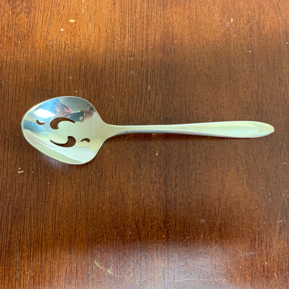 Meriden Silver Plate Co Slotted but spoon 5”